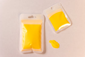 Dreamsicle is a yellow/orange pigment in the light.